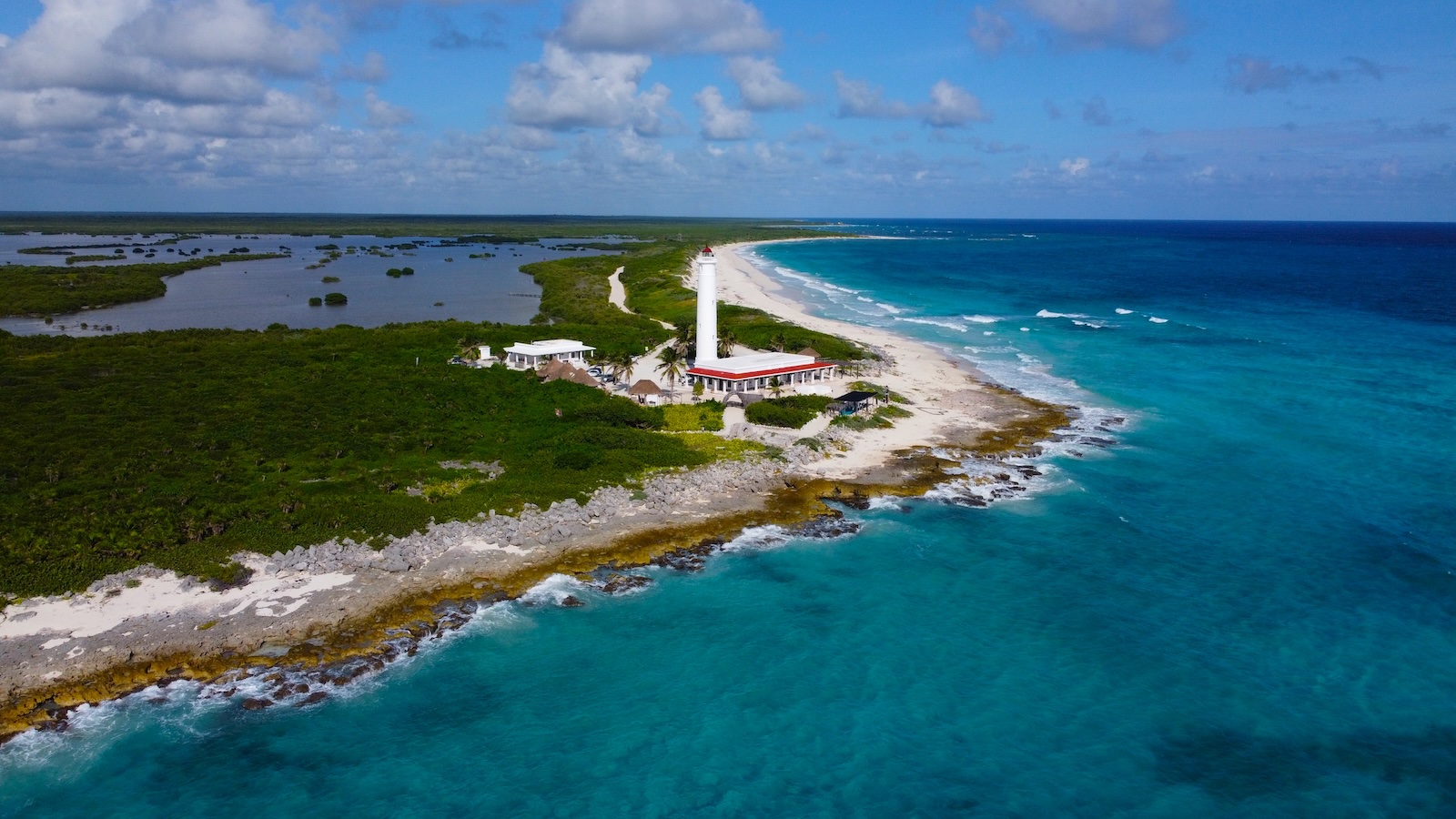 Cozumel lighthouse point surrounded by turquoise water